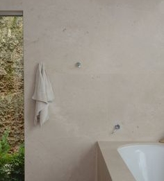 cream limestone bathroom